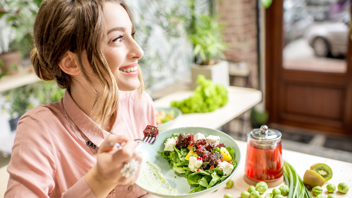 Woman Eating Healthy Green Food
