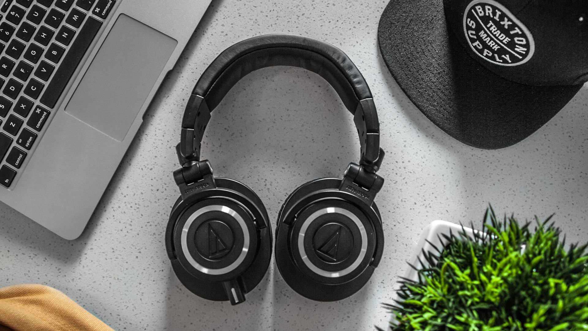 Black Wireless Headphones On White Table