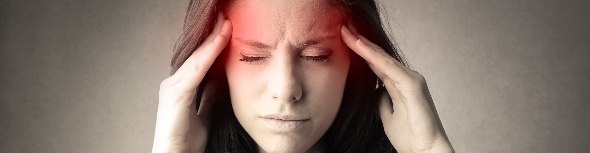 a photo of a woman with headache