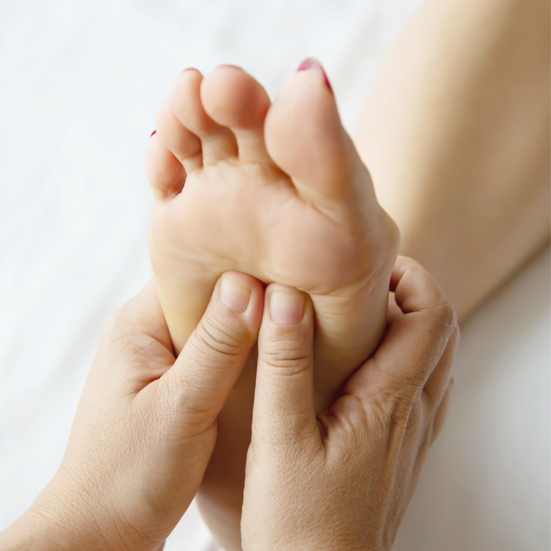 Woman having feet massage