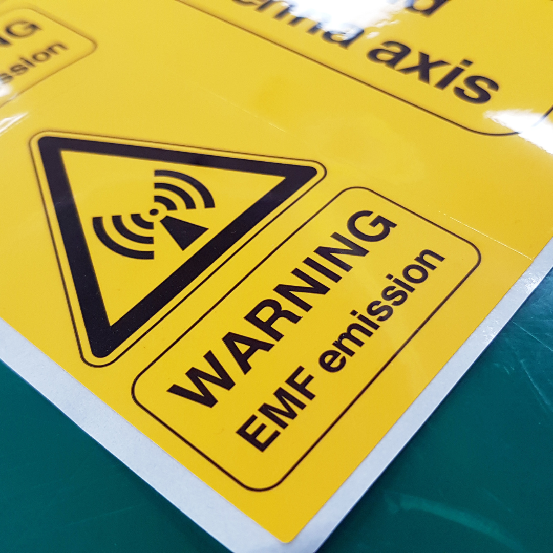 Warning EMF Symbol Sign,Radiation warning sign on the Hazardous materials transport label Class 7 at the aluminum container of transport truck