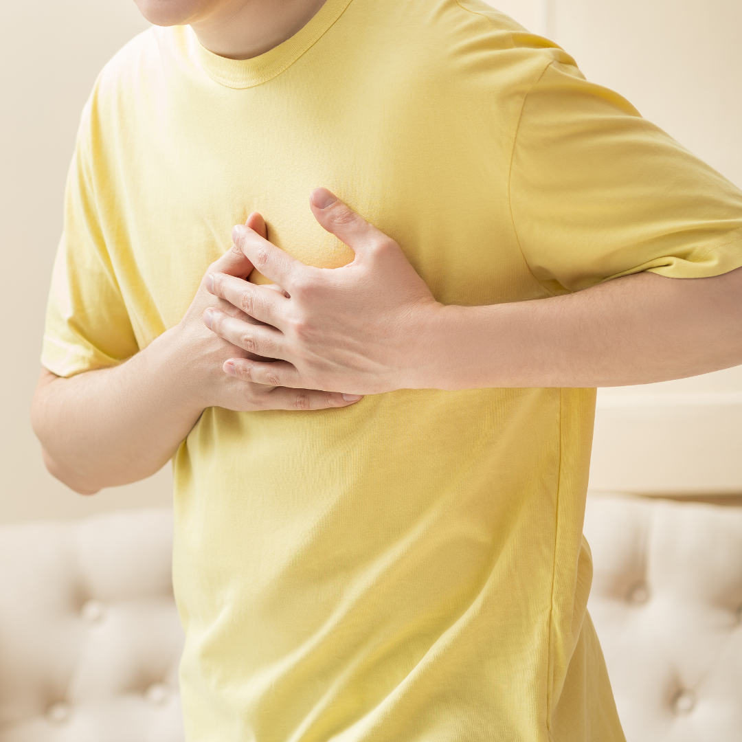 Heart attack, man with chest pain suffering at home
