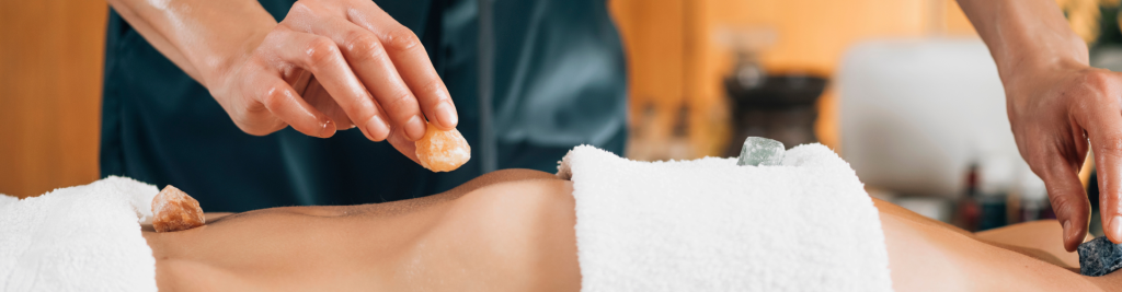 Ayurvedic Practitioner Using Gemstones And Crystals For Healing Female Patient Chakras