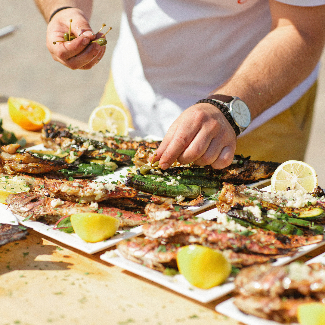 Cook Preparing Fish Meals