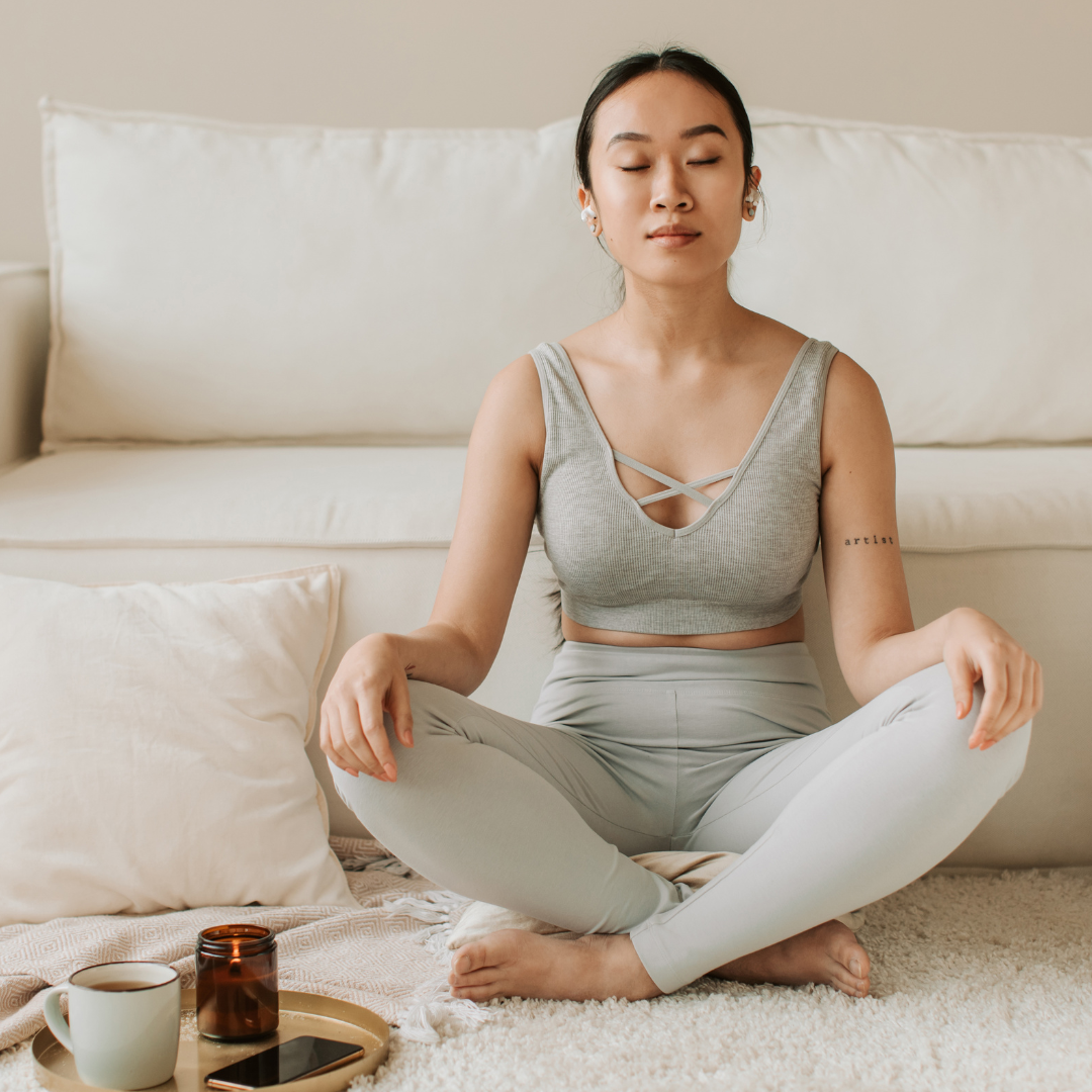 Woman Meditating at Home