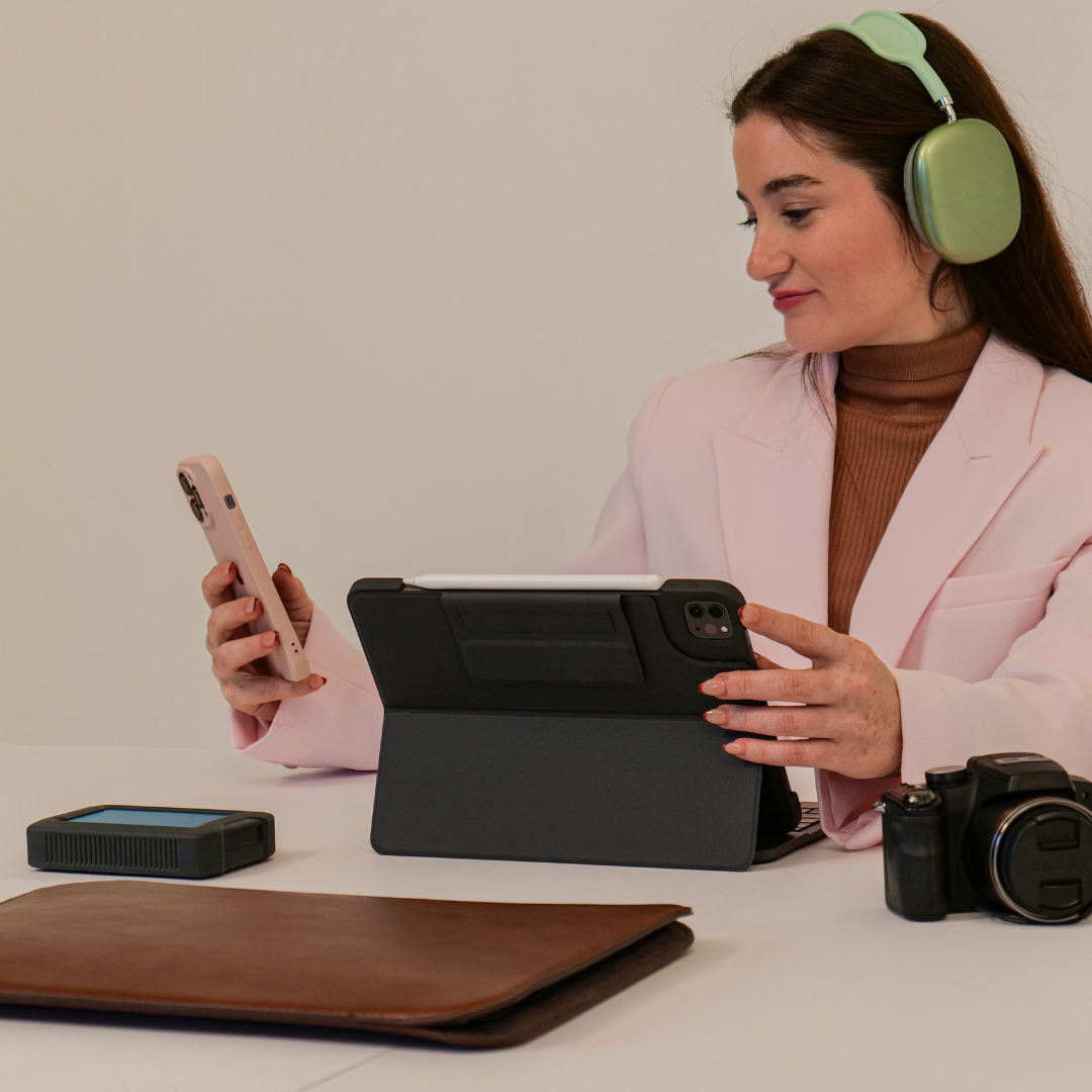 Woman Using Multiple Gadgets