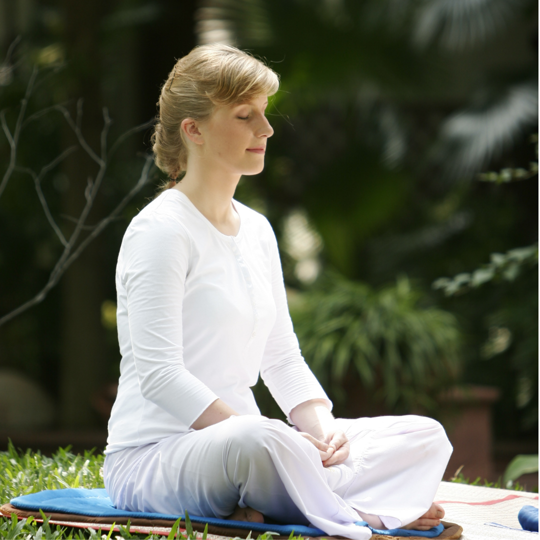 Woman Meditating in Nature