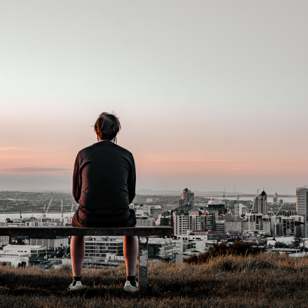 Man Sitting on Bench