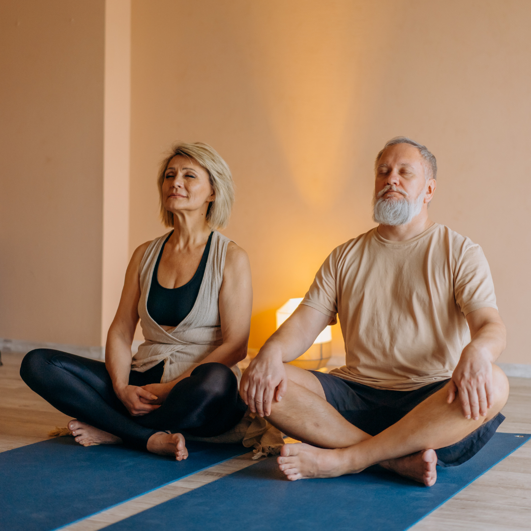 Elderly Couple Meditating