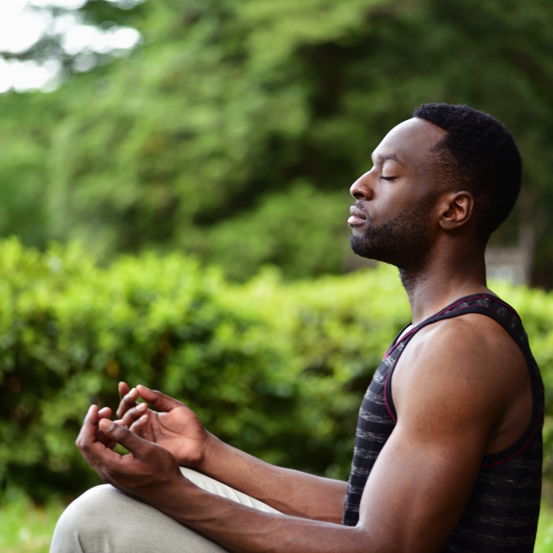 Young man meditating