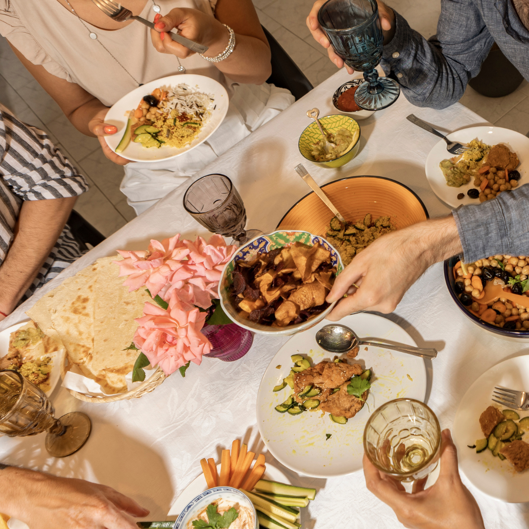 Top View of Friends Eating Vegan Food