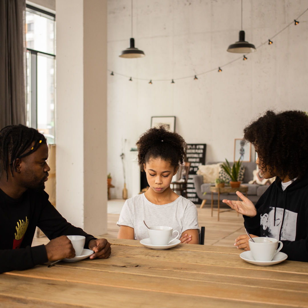 Parents Lecturing their Daughter