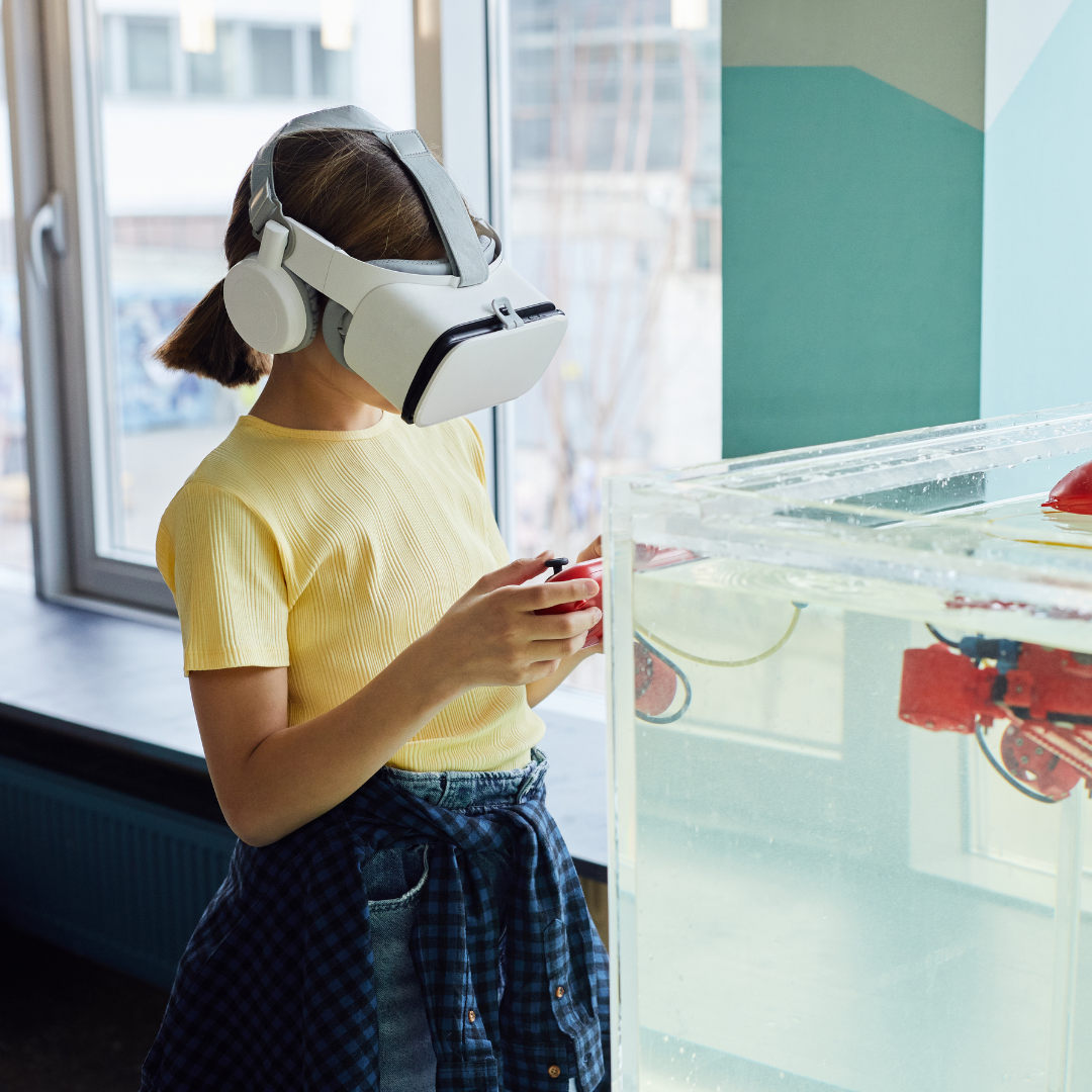 Girl using VR headset testing new device