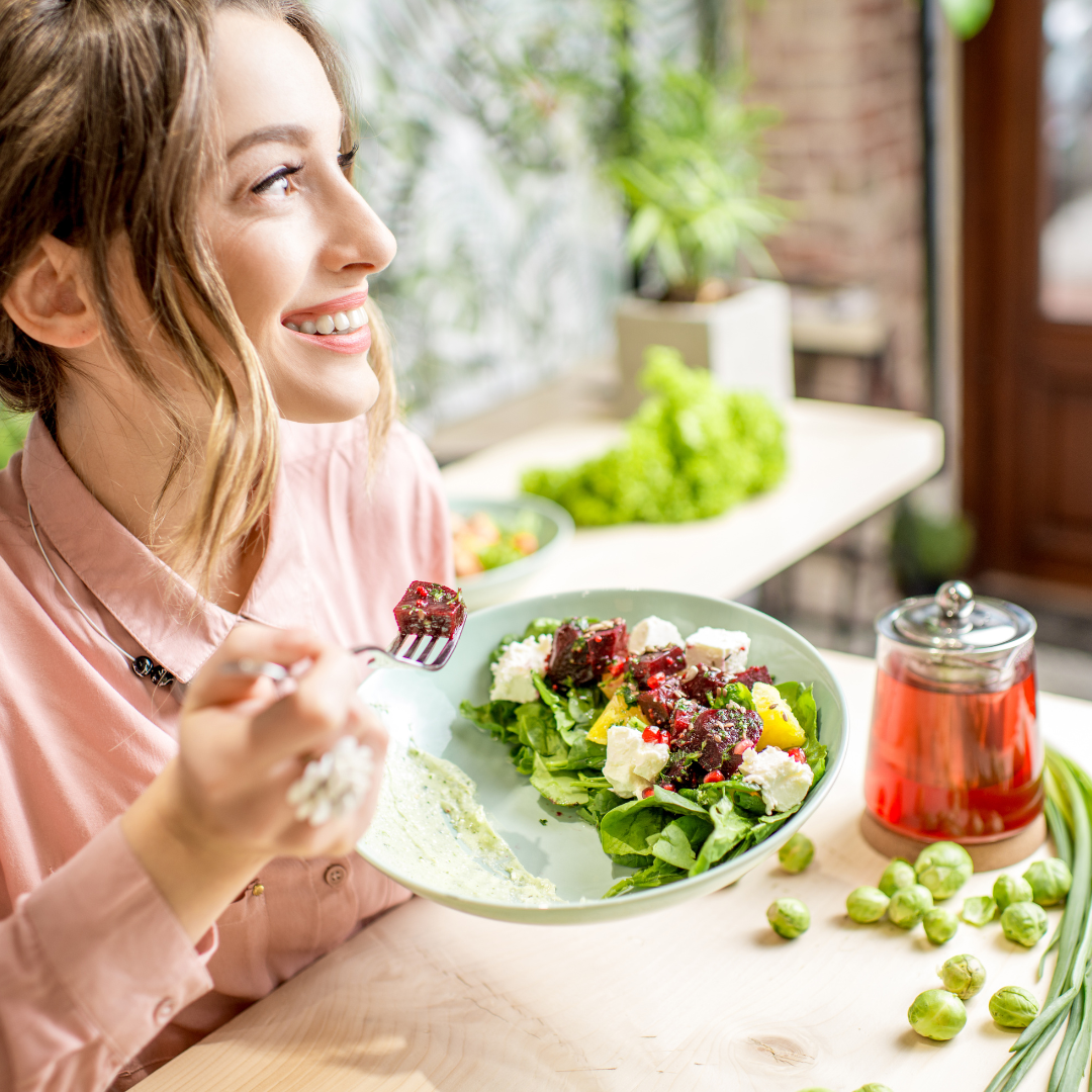 Woman Eating Healthy Green Food