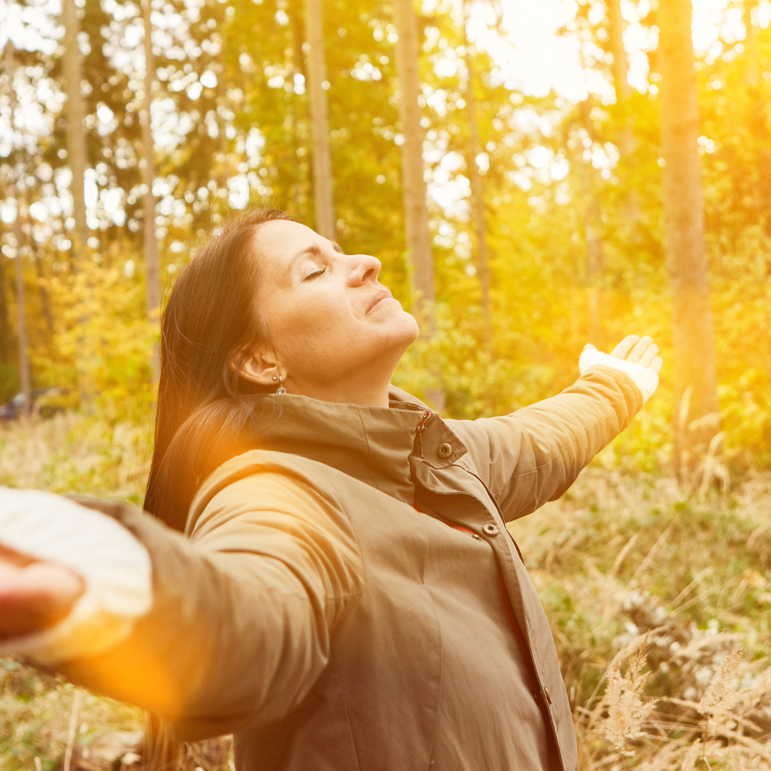 Woman Breathing Air in the Forest with Breathing Exercise
