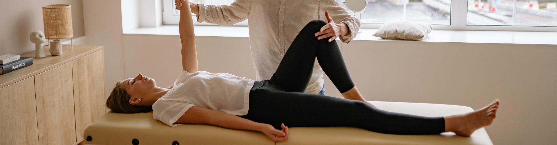 A Woman Lying on the Therapy Bed