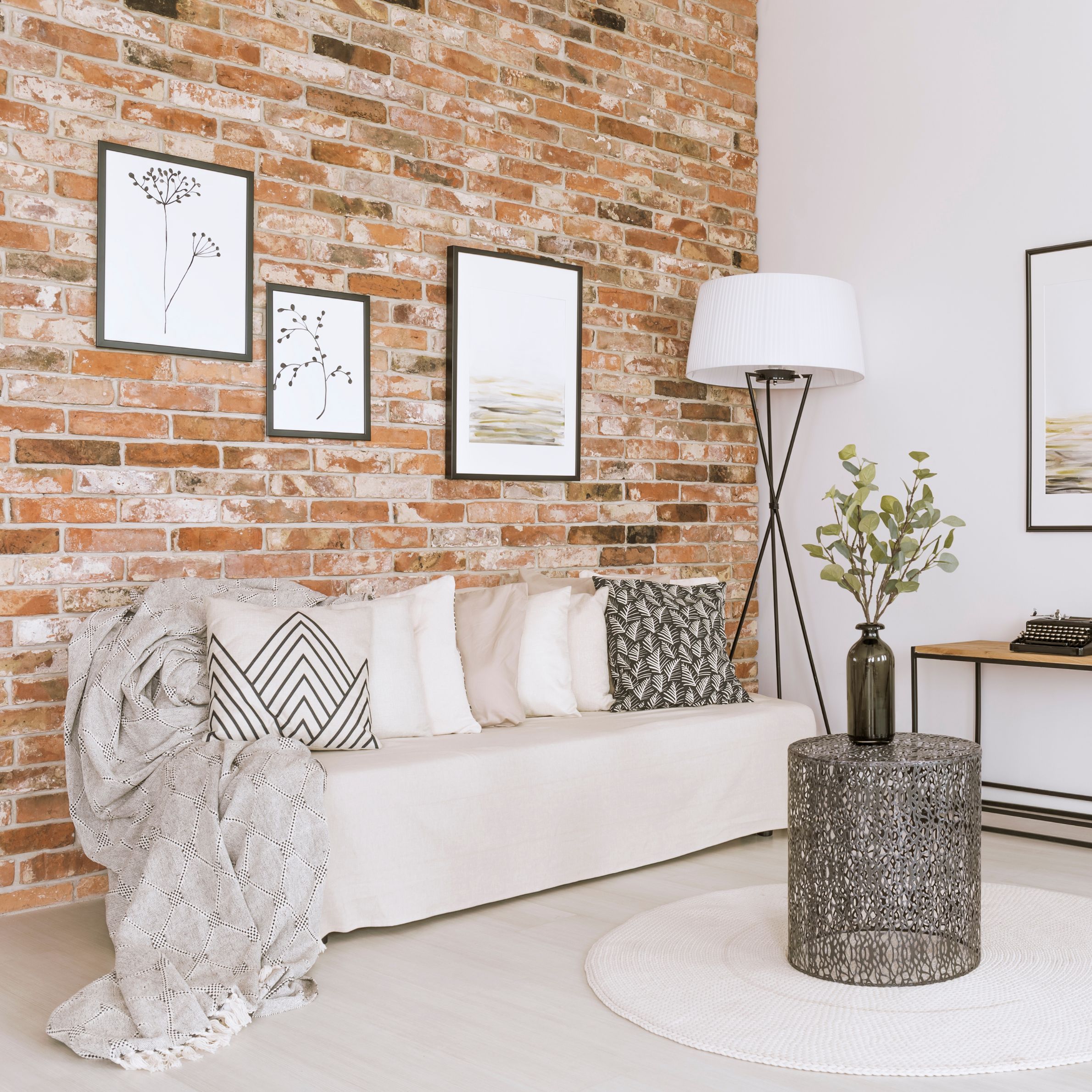 Living room with brick wall
