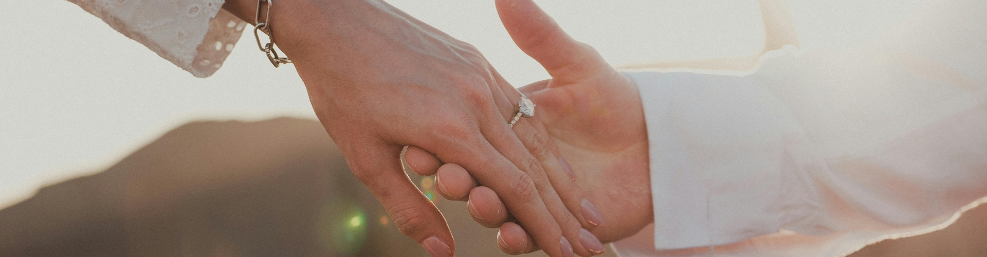 Romantic Sunset Engagement Hand Holding